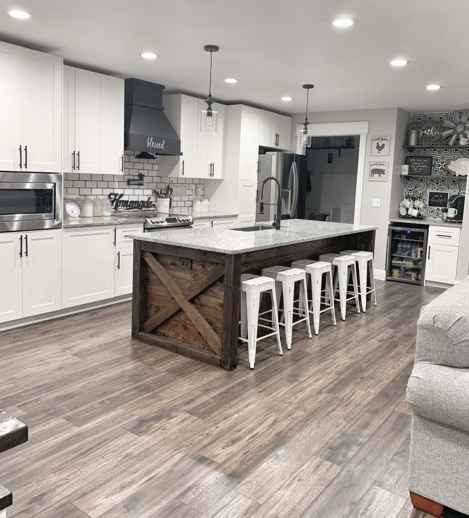 modern farmhouse style neutral kitchen subway tile wood range hood large island coffee bar